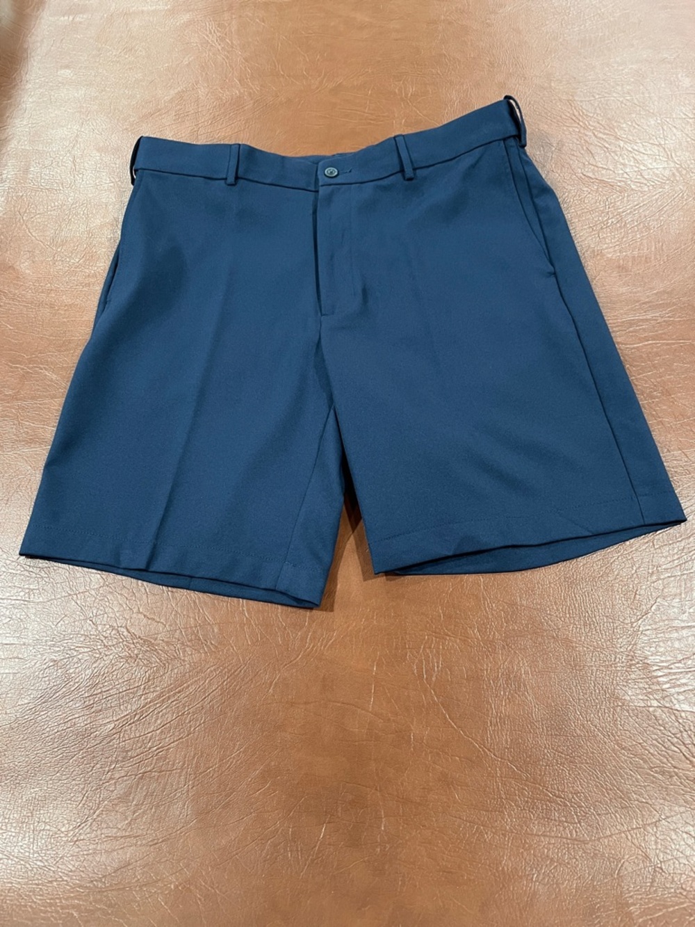 Perry Ellis men’s grand slam shorts.